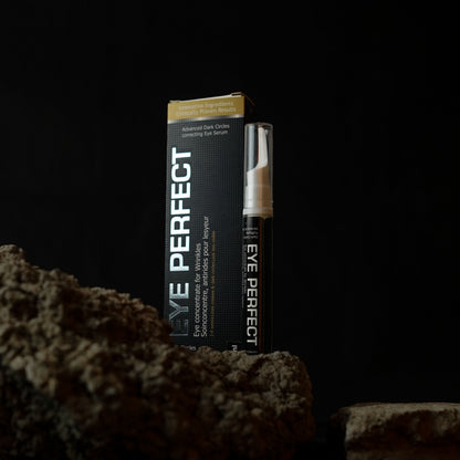 Eye Perfect eye serum packaging on a dark background. Price of Eye Perfect Dark Circle Serum is 1650 Rs